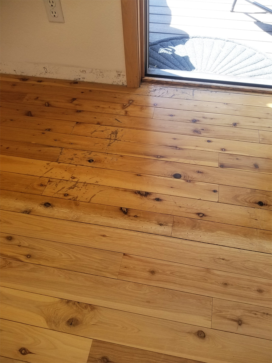 Damaged Wood Flooring (Before Picture)