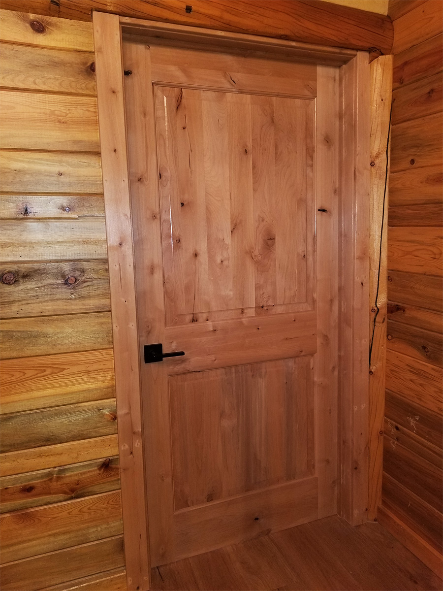 Custom Door Reconditioned Log Home