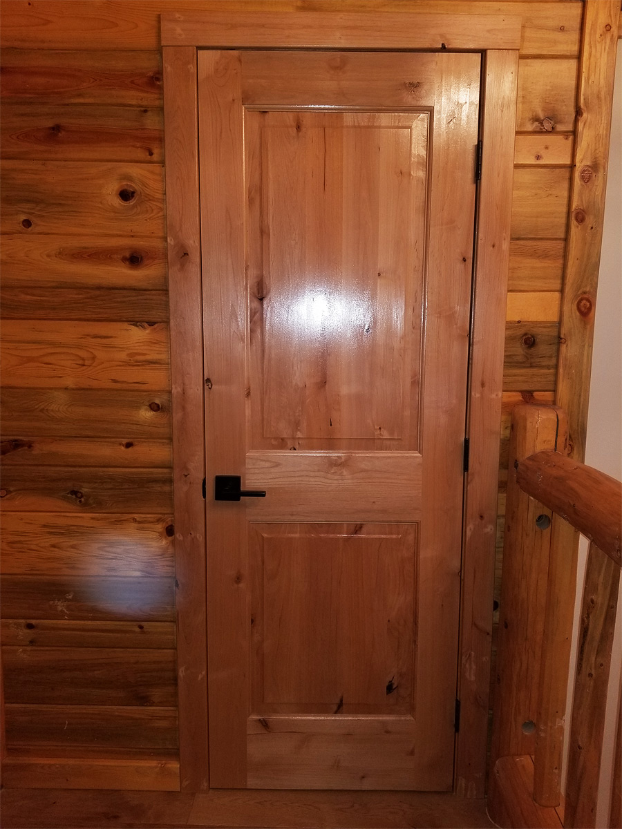 Custom Door Reconditioned Log Home