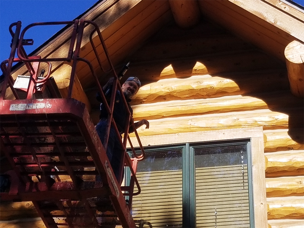 Log Home Construction with Crane Bucket