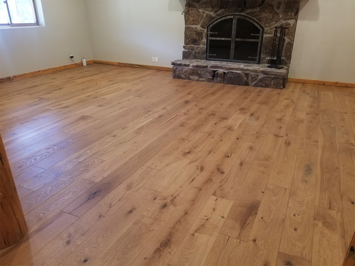 Refurbished Log Home Room with Fireplace