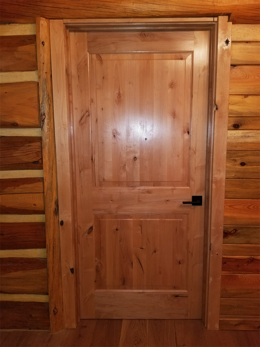 Custom Door Reconditioned Log Home