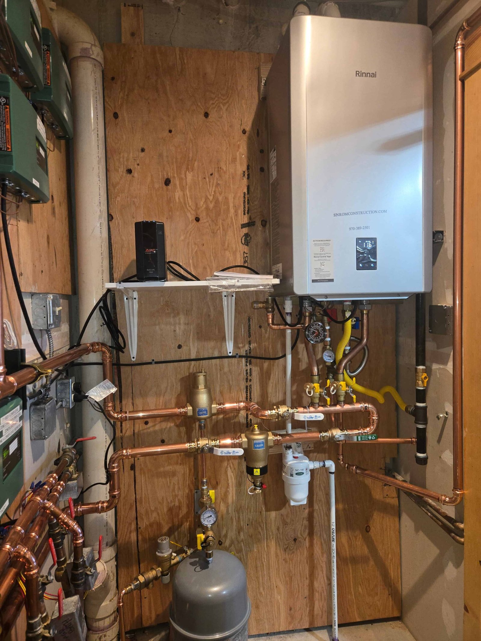 Hydronic radiant heating equipment installed by Sinrom Construction